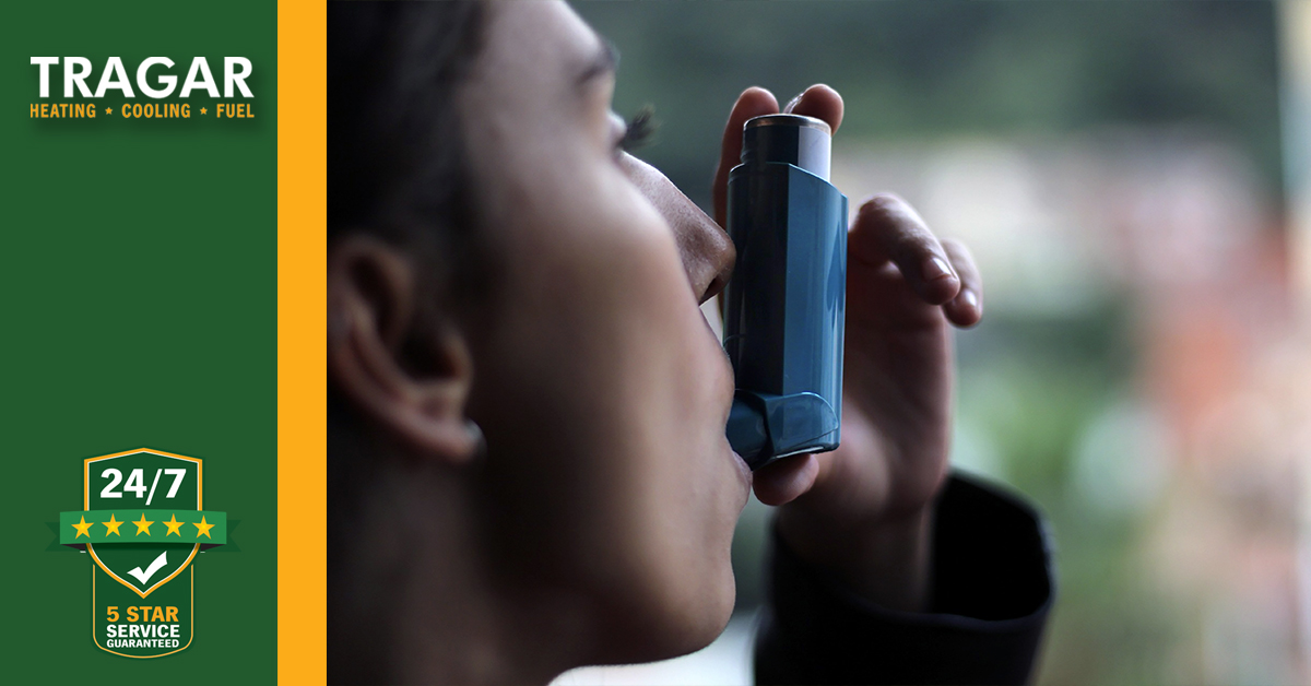 Woman using inhaler